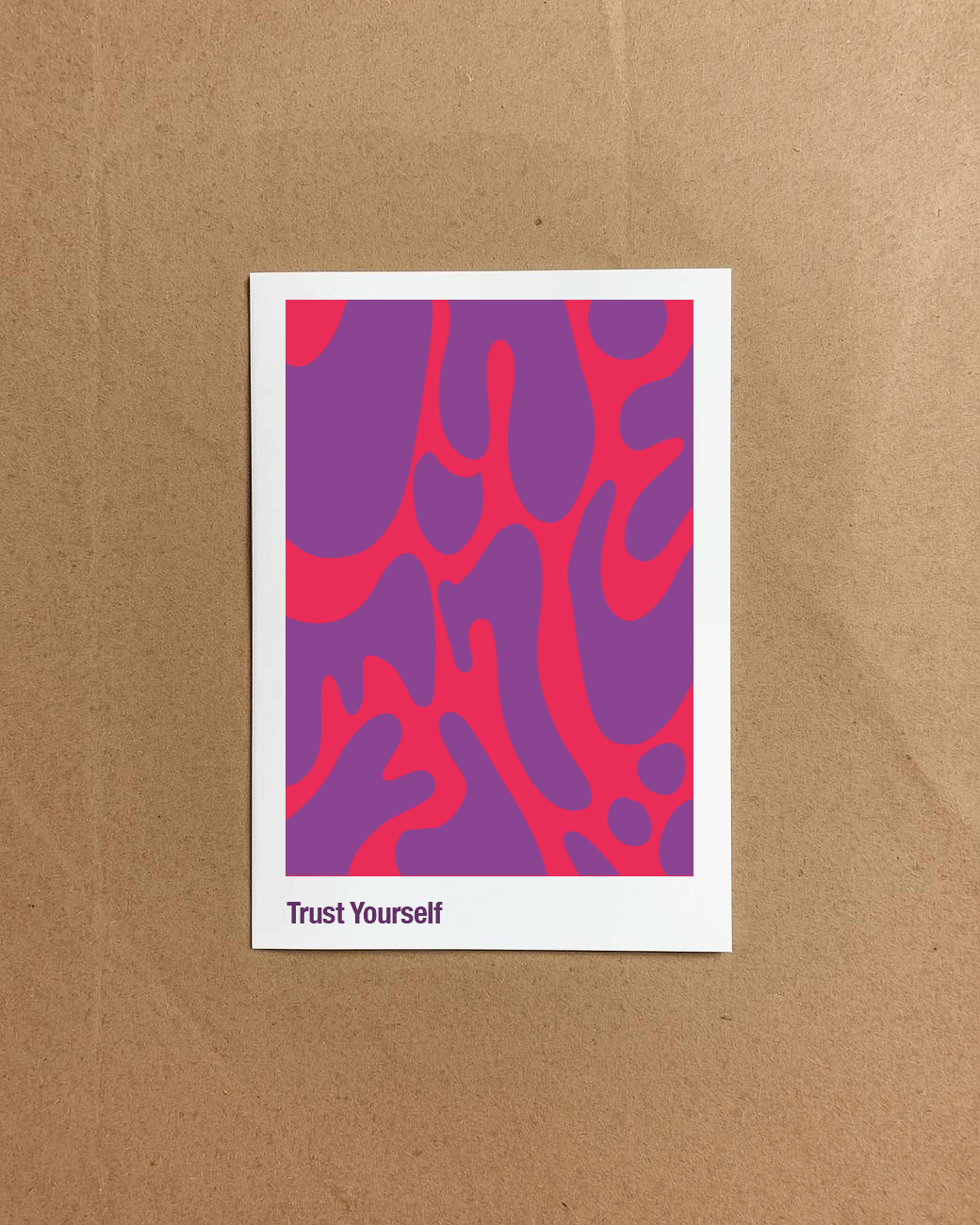 Trust Yourself abstract digital artwork featuring organic pink and purple shapes on a vibrant background displayed as a framed print.